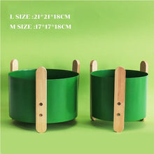 Load image into Gallery viewer, 2 green coloured Gipsy planter pots on a green background