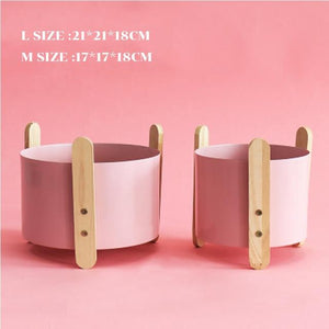 2 pink coloured Gipsy planter pots on a pink background