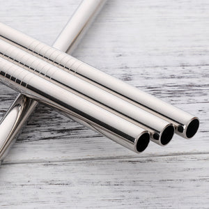 closeup image of 4 silver stainless steel straws