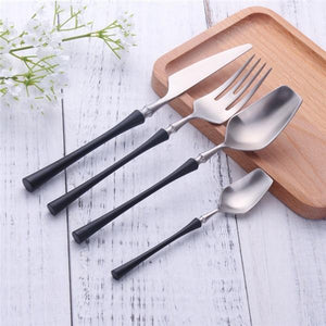 BLACK AND GOLD PLATED 4 PIECE ROYALTY CUTLERY SET