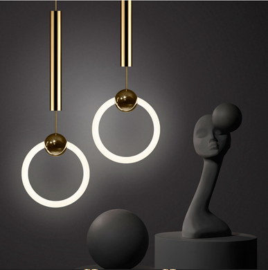 Two prague pendant lights near a white statue -FunkChez