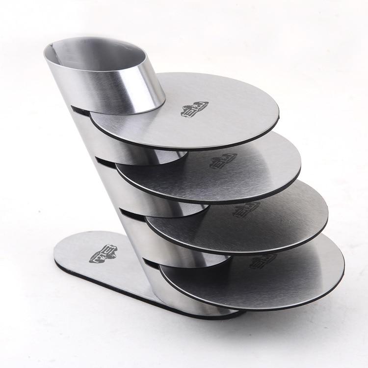4 stainless steel coasters on a stand