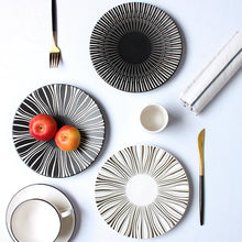 Load image into Gallery viewer, 2 PLATES FROM THE DEJAVU DINNERWARE COLLECTION PLACED ON A TABLE SETTING