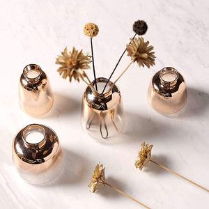 set of 4 elegant rose gold glass vases with flowers
