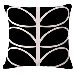 Funky black cushion cover with white abstract leaves