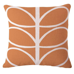 Funky orange cushion cover with white abstract leaves