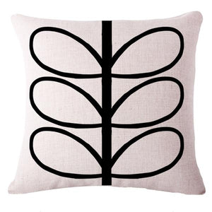 Funky white cushion cover with black abstract leaves