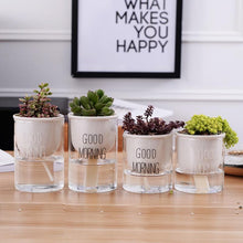 Load image into Gallery viewer, 4 different sized self watering planters with a plant and the words &#39;good morning&#39; printed on the glass in white