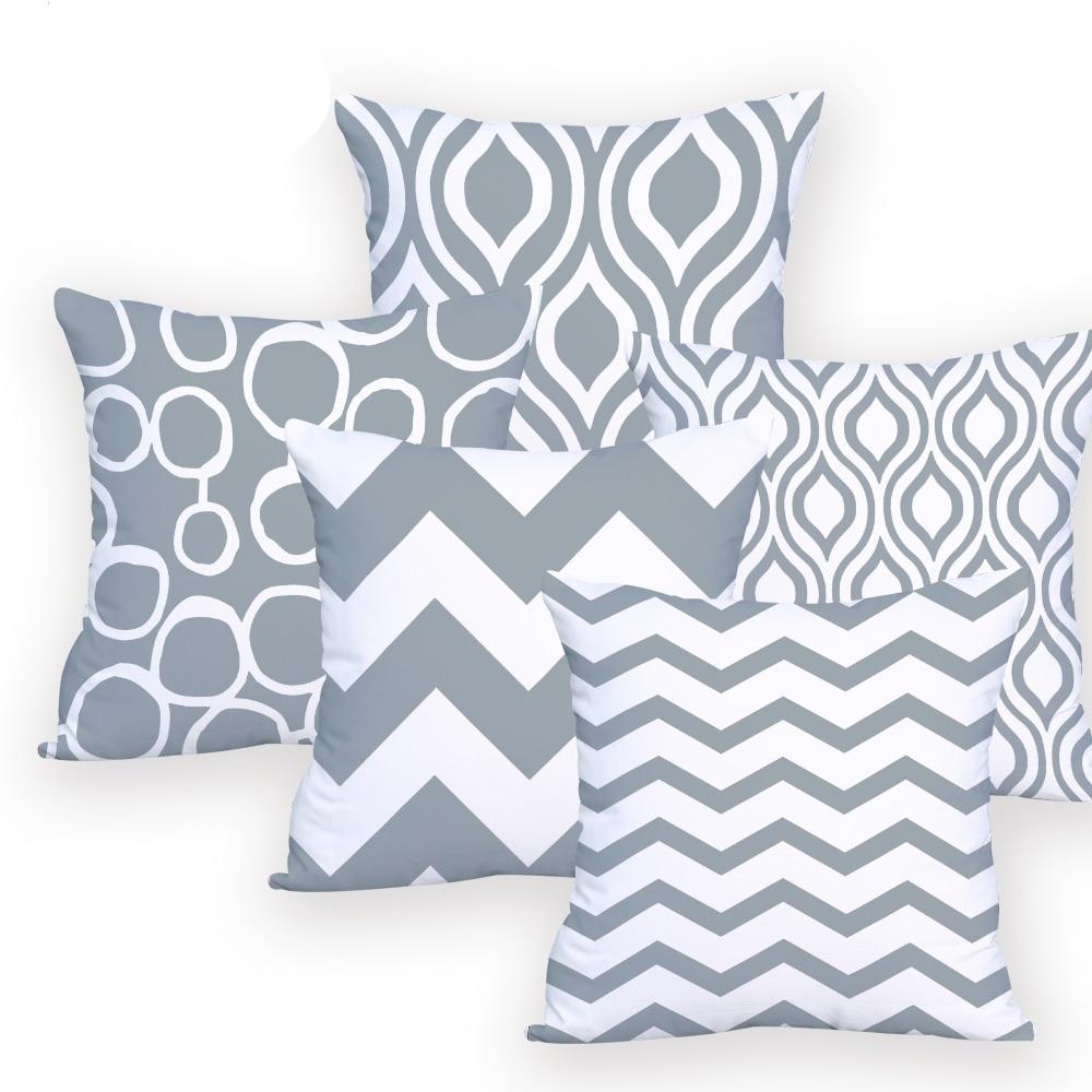 Grey and White cushion covers on cushion pillows