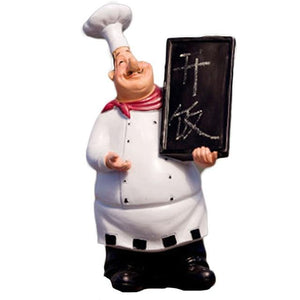 1 chef figurine statue holding a black board in his left hand