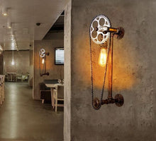 Load image into Gallery viewer, INDUSTRIAL BICYCLE CHAIN LIGHTS DISPLAYED IN A RESTAURANT