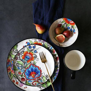 Lilyrose dinnerset with 2 plates, a fork , a bowl of fruits and a cup from FunkChez