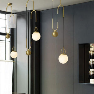 3 Madorne pendant lights hanging from the ceiling - FunkChez