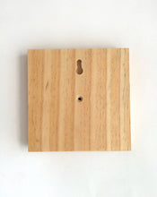 Load image into Gallery viewer, back of the wall mounted country style toilet roll holder in wood finish
