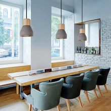 Load image into Gallery viewer, 3 amara pendant lights in grey and wood finish set in a dining room