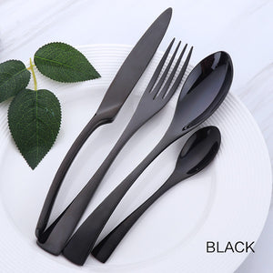 4 cutlery pieces in black colour from the nordane cutlery set collection