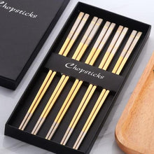 Load image into Gallery viewer, 5 pairs of yellowish gold with white colored ends chopsticks in a black box