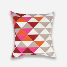Load image into Gallery viewer, mix of reds, brown and white in geometric patterns printed on a cushion cover