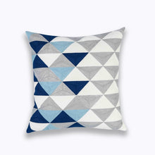 Load image into Gallery viewer, mix of blues, grey and white in geometric patterns printed on a cushion cover