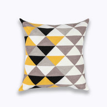 Load image into Gallery viewer, mix of yellow, black, brown and white in geometric patterns printed on a cushion cover