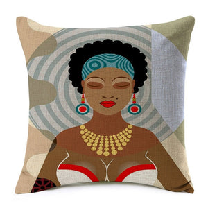 african lady's face wearing ear rings and a necklace printed on a throw cover