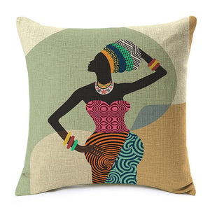 african lady posing in a bright coloured dress printed on a throw cover