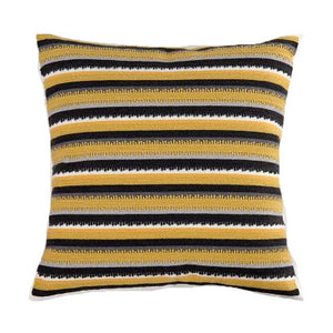 cushion cover with grey, mustard yellow, black and white in geometrical stripes