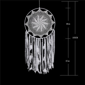 white dreamcatcher with size specifications on a black background