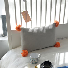 Load image into Gallery viewer, grey cushion with orange tassels on all four ends FunkChez