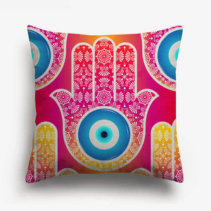 hand with a circle in the center printed on a cushion cover
