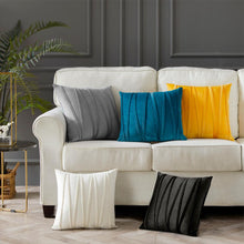 Load image into Gallery viewer, 5 cushions in grey, blue, mustard yellow, ivory and black placed on a couch 