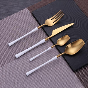 WHITE AND GOLD 4 PIECE CUTLERY ROYALTY SET