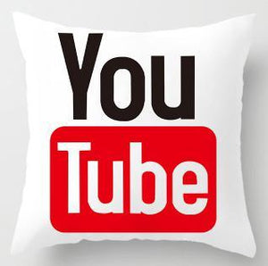 youtube logo printed in white and red on a cushion cover