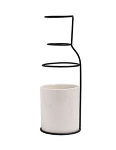 large viral vase with white ceramic pot