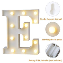 Load image into Gallery viewer, LETTER E LIT WITH BULBS AND SHOWING BATTERY SOURCE