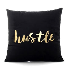Load image into Gallery viewer, The word Hustle printed in gold on a black polyester throw pillow 