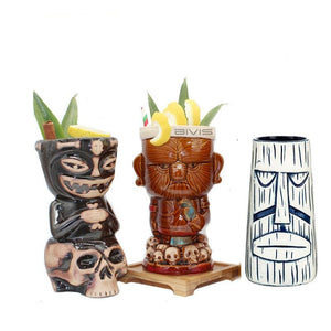 3 different tiki tumblers with cocktails