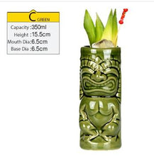 Load image into Gallery viewer, green tiki mug filled with cocktail and some veggies with size specifications