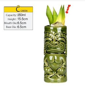 green tiki mug filled with cocktail and some veggies with size specifications