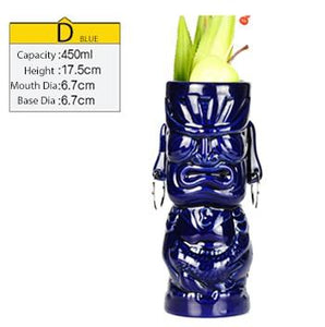 tall blue ceramic tiki mug filled with a cocktail and some veggies and size specifications