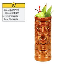 Load image into Gallery viewer, tall brown ceramic tiki mug filled with a cocktail and some veggies and size specifications