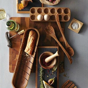 wooden bowls, egg box, spatula, spoon, cutting board